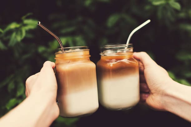 Two Glass Jars of Ice Coffee